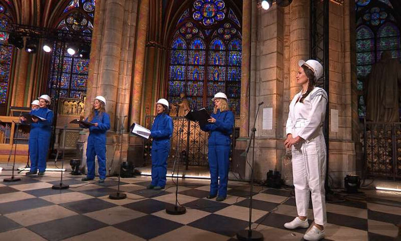 A-group-of-people-standing-in-front-of-a-building-maitrise-notre-dame-de-paris-soprani-singer-julie-_206955_